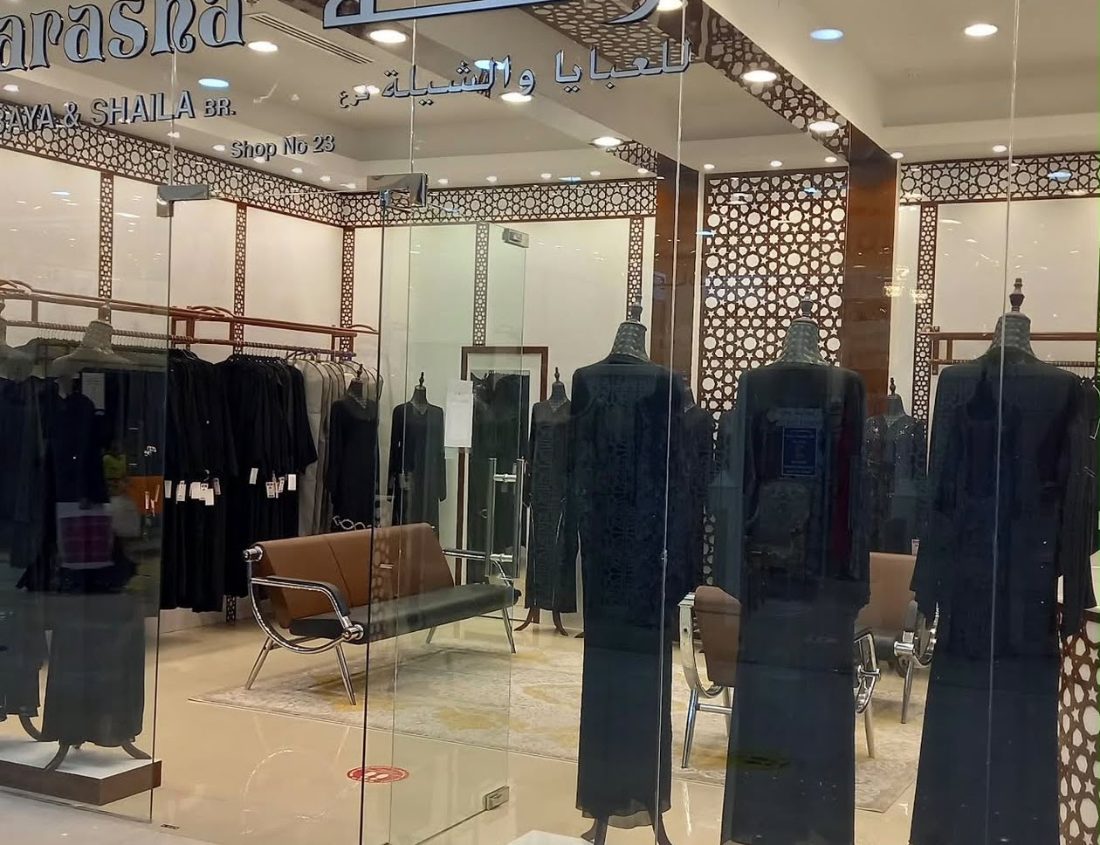 Farasha branch storefront with abayas on display