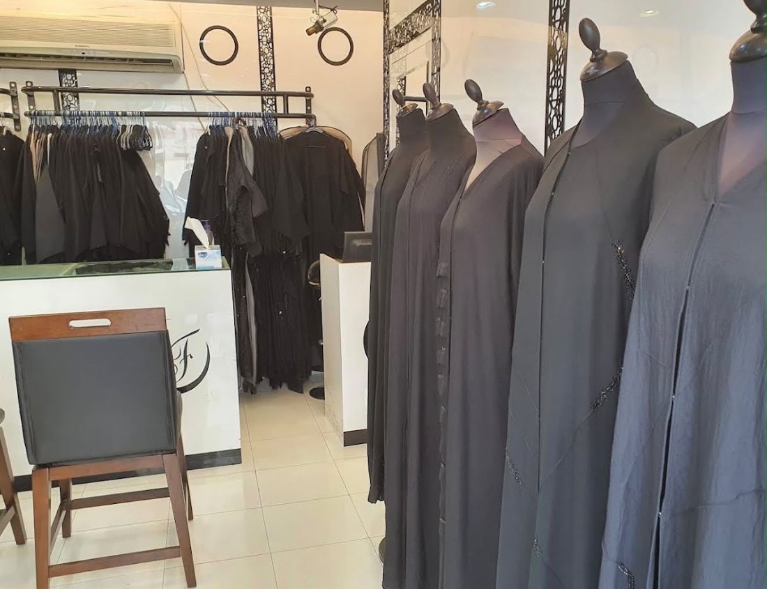 Grey and black abayas on mannequins